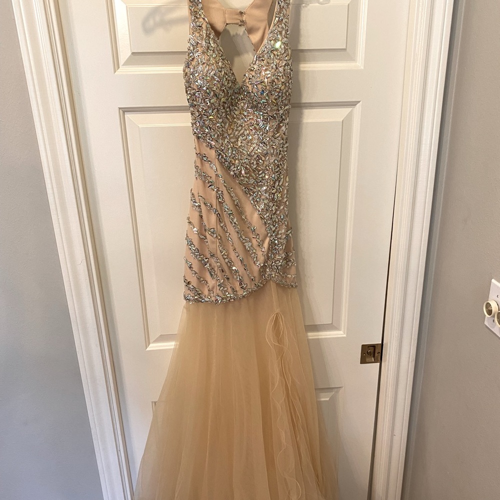 Nude colored floor length dress with split